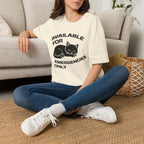 T-Shirt — 'AVAILABLE FOR EMERGENCIES ONLY' Tired Cat Graphic Tee (Tired jokes)