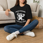 T-Shirt — 'Brave Enough For Bad Ideas' Tired Cat Graphic Tee (Tired jokes)