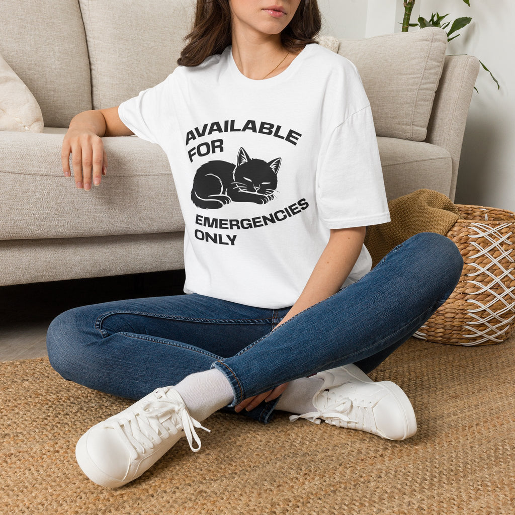 T-Shirt — 'AVAILABLE FOR EMERGENCIES ONLY' Tired Cat Graphic Tee (Tired jokes)