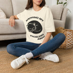 T-Shirt — 'NAPPING MY PROBLEMS AWAY' Tired Cat Graphic Tee (Tired jokes)