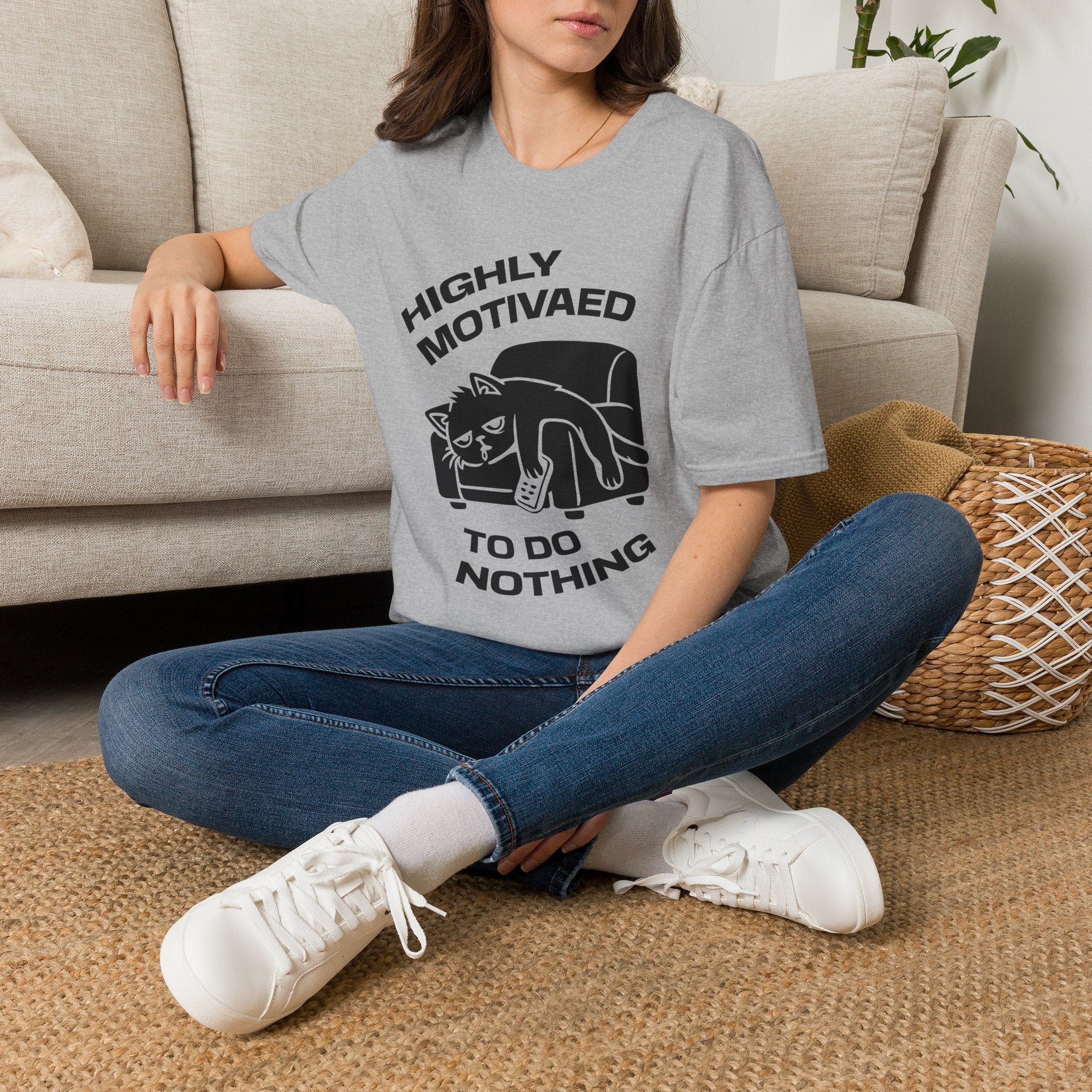 T-Shirt — 'HIGHLY MOTIVATED TO DO NOTHING' Tired Cat Graphic Tee (Tired jokes)