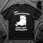T-Shirt — 'Not Disappointed Just Not Surprised' Tired Cat Graphic Tee (Tired jokes)