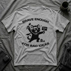 T-Shirt — 'Brave Enough For Bad Ideas' Tired Cat Graphic Tee (Tired jokes)