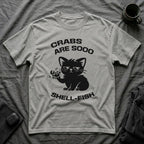 T-Shirt — 'CRABS ARE SO SHELL-FISH' Tired Cat Graphic Tee (Tired jokes)