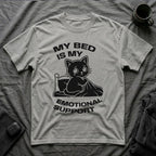 T-Shirt — 'MY BED IS MY EMOTIONAL SUPPORT' Tired Cat Graphic Tee (Tired jokes)