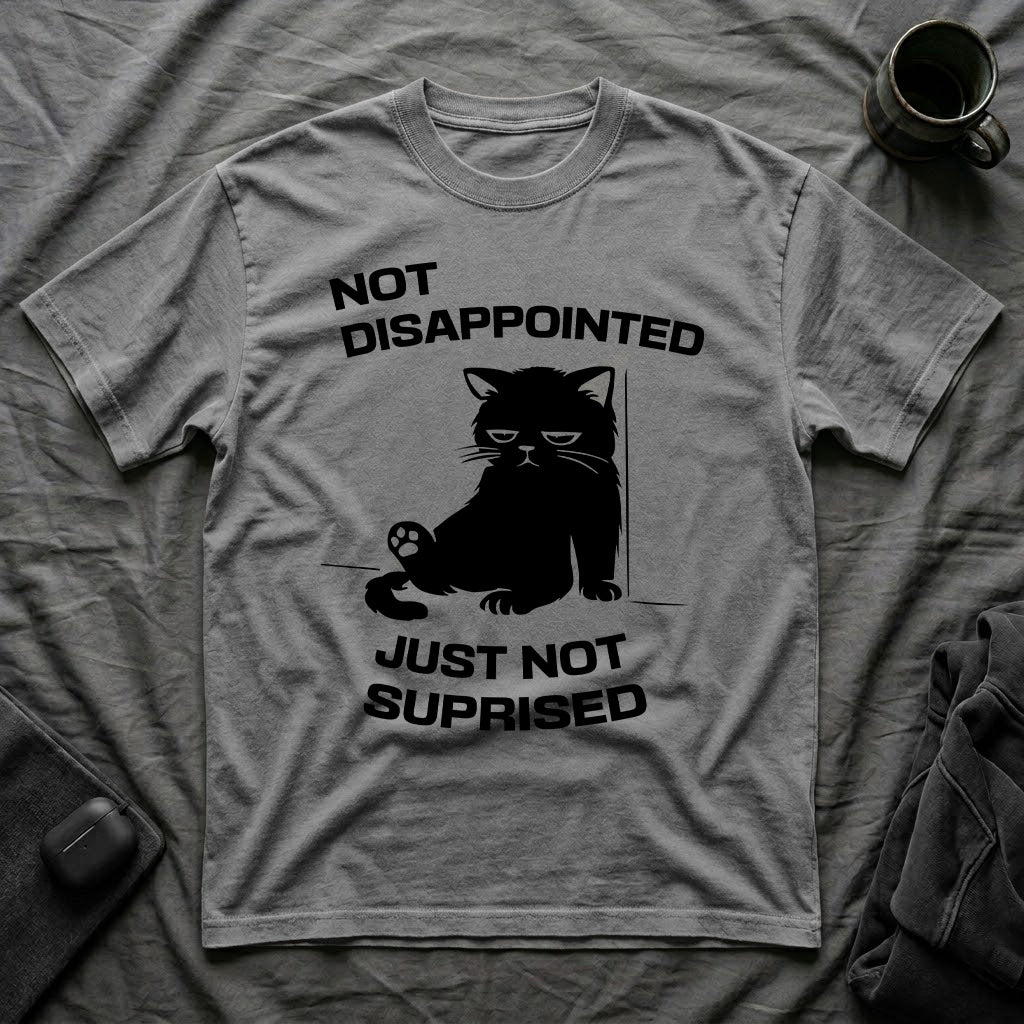 T-Shirt — 'Not Disappointed Just Not Surprised' Tired Cat Graphic Tee (Tired jokes)