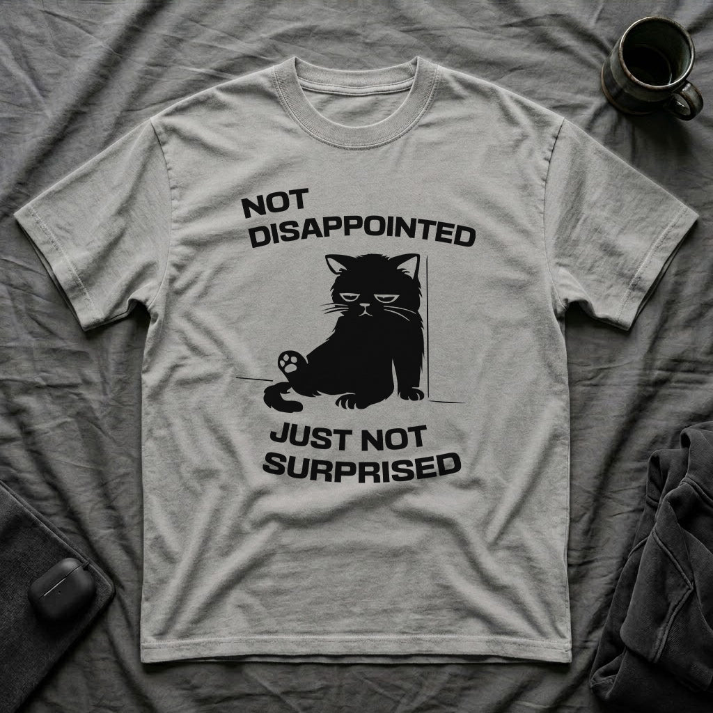 T-Shirt — 'Not Disappointed Just Not Surprised' Tired Cat Graphic Tee (Tired jokes)