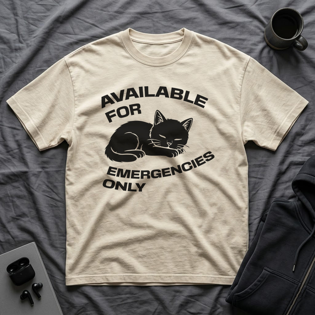 T-Shirt — 'AVAILABLE FOR EMERGENCIES ONLY' Tired Cat Graphic Tee (Tired jokes)