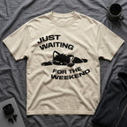 T-Shirt — 'JUST WAITING FOR THE WEEKEND' Tired Cat Graphic Tee (Tired jokes)