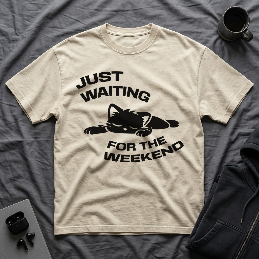 T-Shirt — 'JUST WAITING FOR THE WEEKEND' Tired Cat Graphic Tee (Tired jokes)