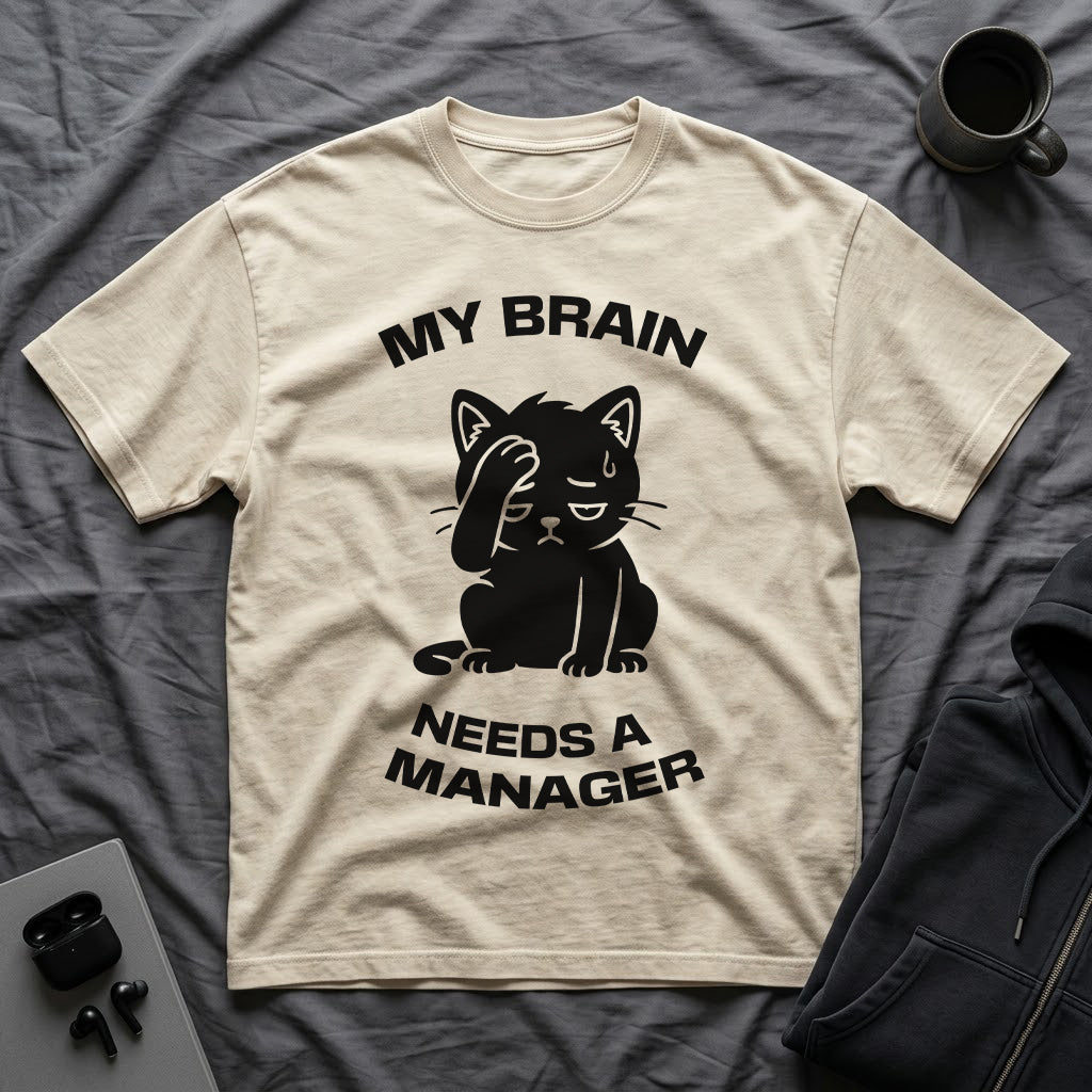T-Shirt — 'My Brain Needs a Manager' Tired Cat Graphic Tee (Tired jokes)
