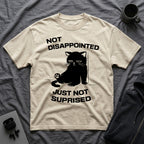 T-Shirt — 'Not Disappointed Just Not Surprised' Tired Cat Graphic Tee (Tired jokes)