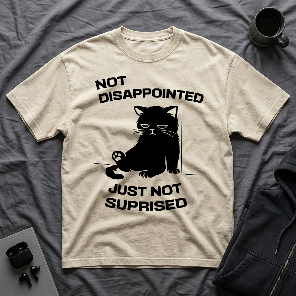 T-Shirt — 'Not Disappointed Just Not Surprised' Tired Cat Graphic Tee (Tired jokes)