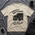 T-Shirt — 'HIGHLY MOTIVATED TO DO NOTHING' Tired Cat Graphic Tee (Tired jokes)