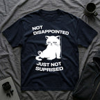 T-Shirt — 'Not Disappointed Just Not Surprised' Tired Cat Graphic Tee (Tired jokes)