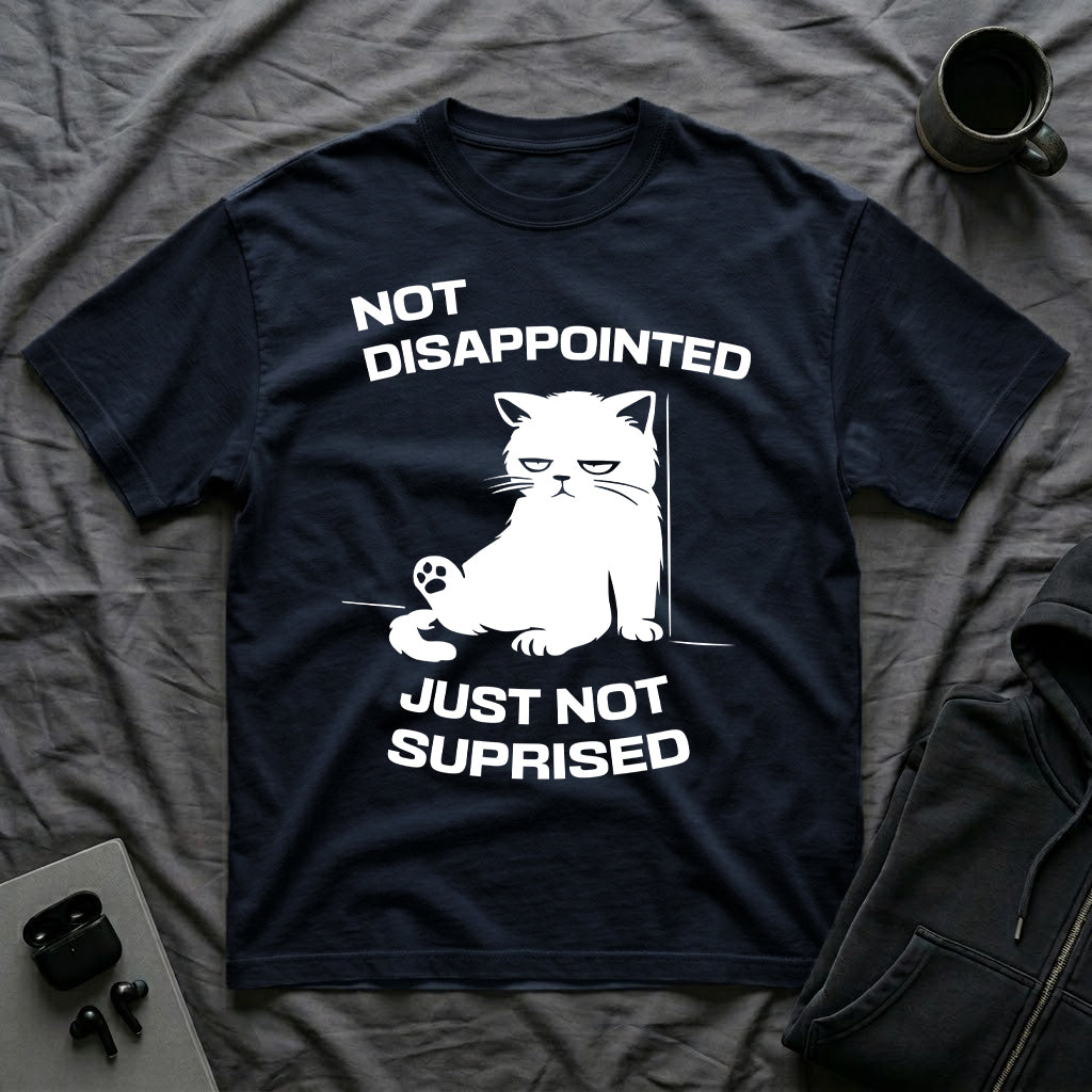T-Shirt — 'Not Disappointed Just Not Surprised' Tired Cat Graphic Tee (Tired jokes)