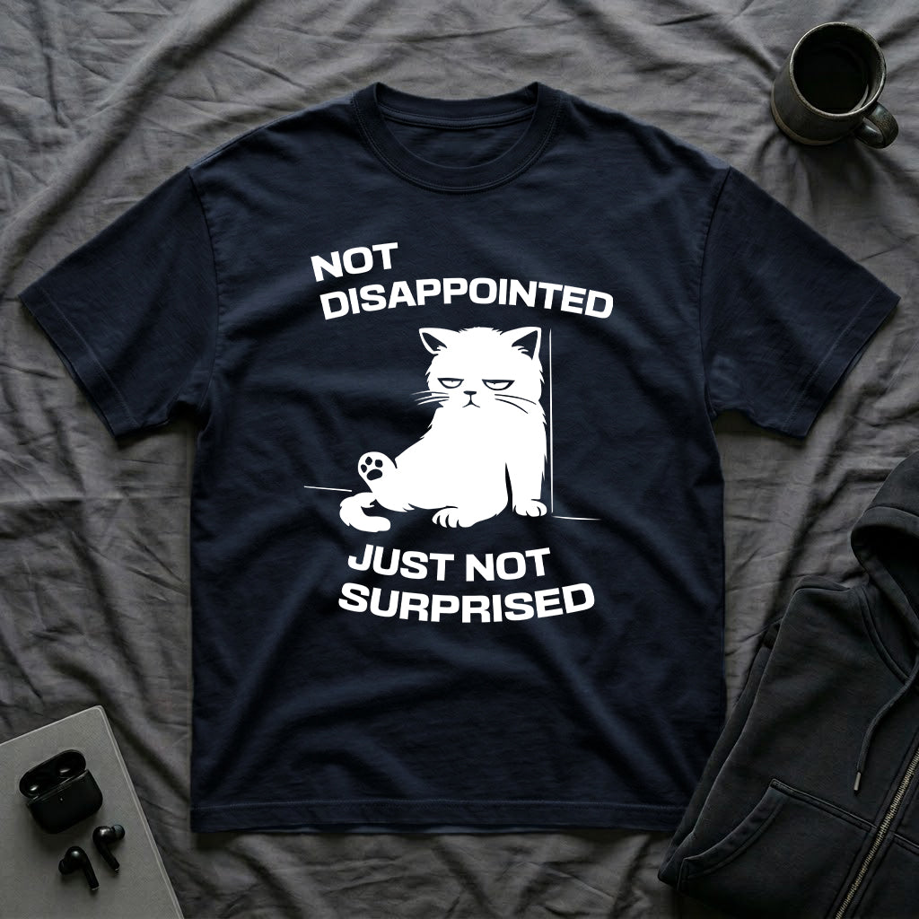 T-Shirt — 'Not Disappointed Just Not Surprised' Tired Cat Graphic Tee (Tired jokes)