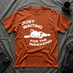 T-Shirt — 'JUST WAITING FOR THE WEEKEND' Tired Cat Graphic Tee (Tired jokes)