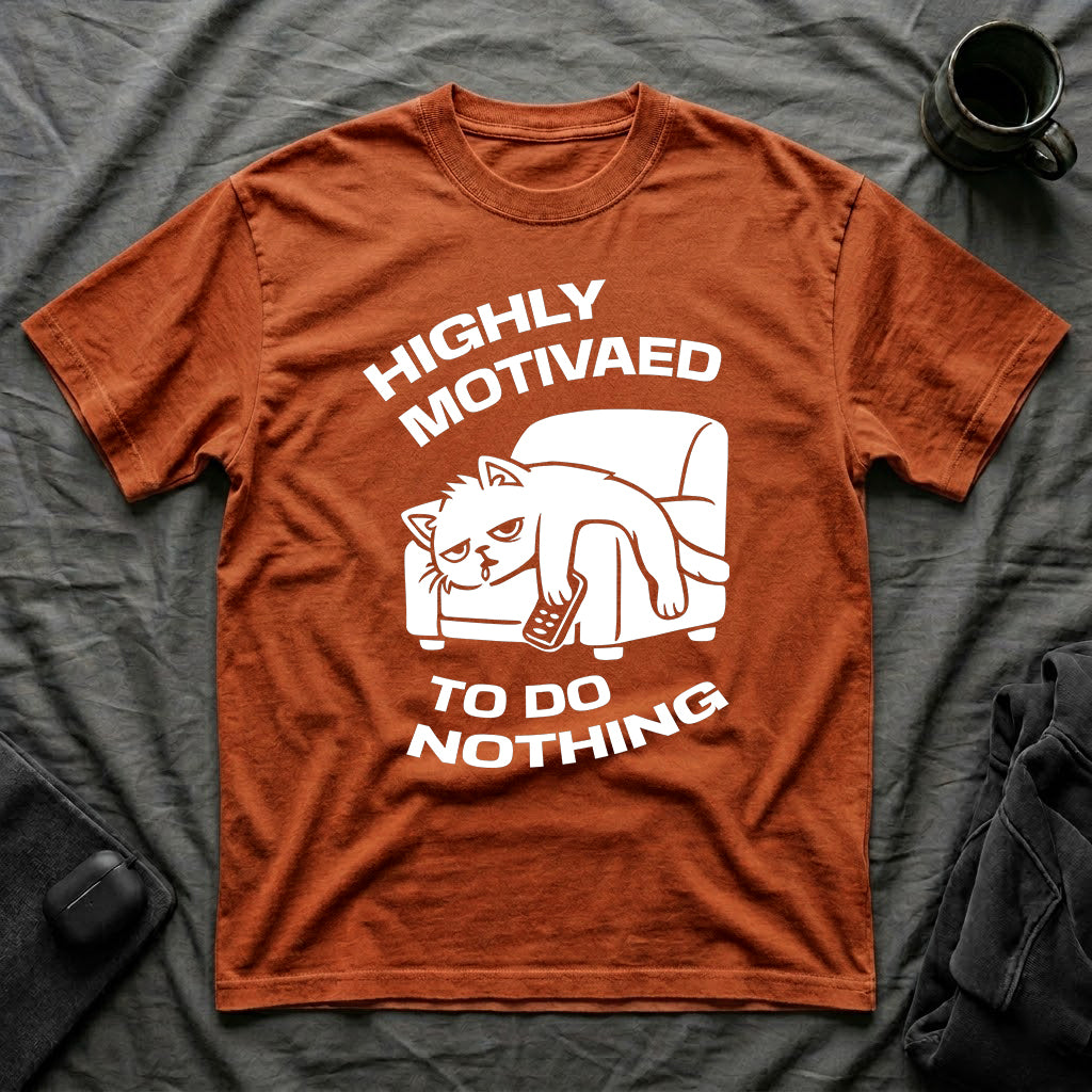 T-Shirt — 'HIGHLY MOTIVATED TO DO NOTHING' Tired Cat Graphic Tee (Tired jokes)
