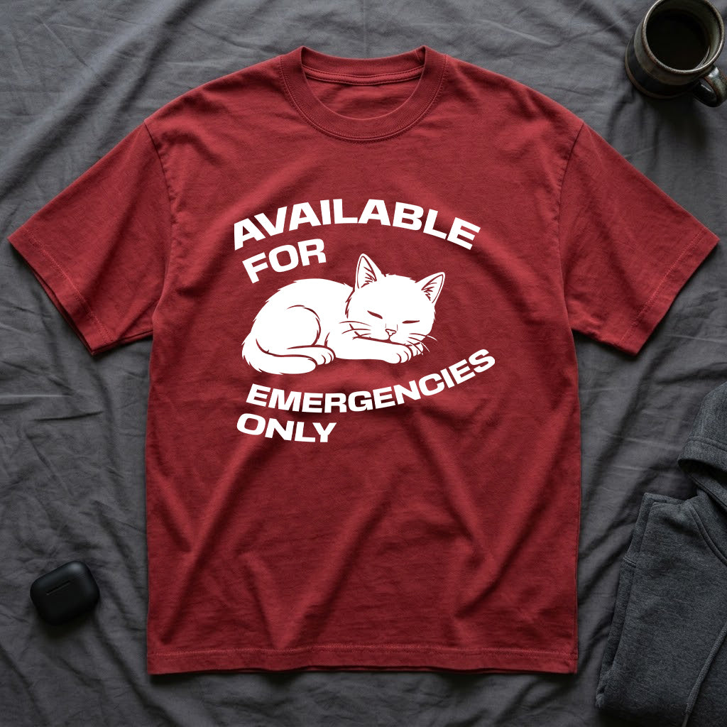 T-Shirt — 'AVAILABLE FOR EMERGENCIES ONLY' Tired Cat Graphic Tee (Tired jokes)