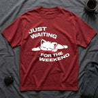 T-Shirt — 'JUST WAITING FOR THE WEEKEND' Tired Cat Graphic Tee (Tired jokes)