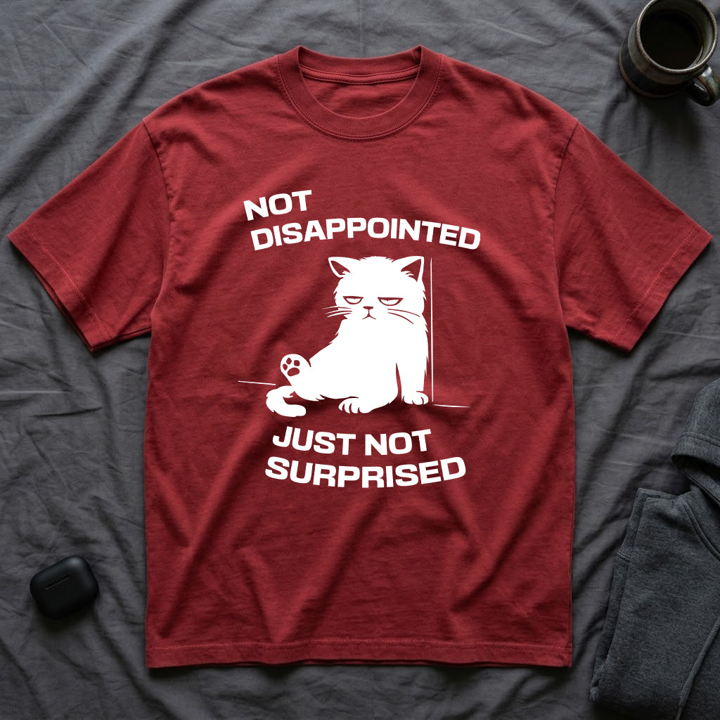 T-Shirt — 'Not Disappointed Just Not Surprised' Tired Cat Graphic Tee (Tired jokes)