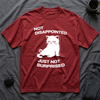 T-Shirt — 'Not Disappointed Just Not Surprised' Tired Cat Graphic Tee (Tired jokes)
