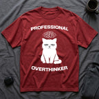 T-Shirt — 'Professional Overthinker' Tired Cat Graphic Tee (Tired jokes)