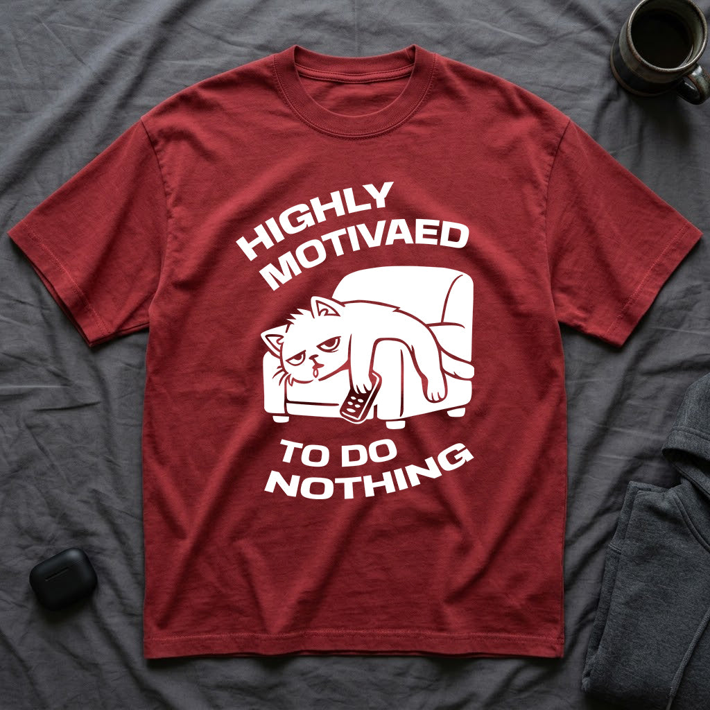 T-Shirt — 'HIGHLY MOTIVATED TO DO NOTHING' Tired Cat Graphic Tee (Tired jokes)