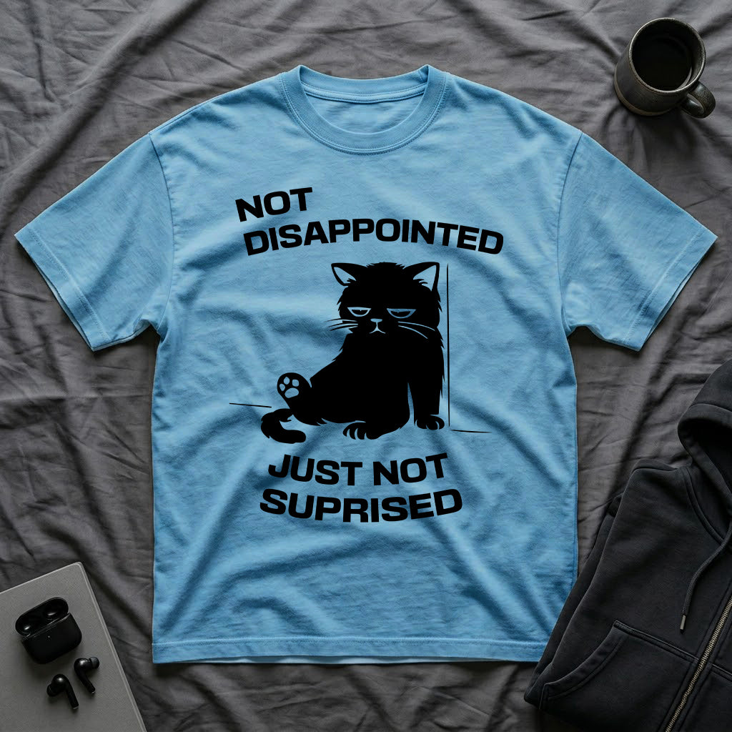 T-Shirt — 'Not Disappointed Just Not Surprised' Tired Cat Graphic Tee (Tired jokes)